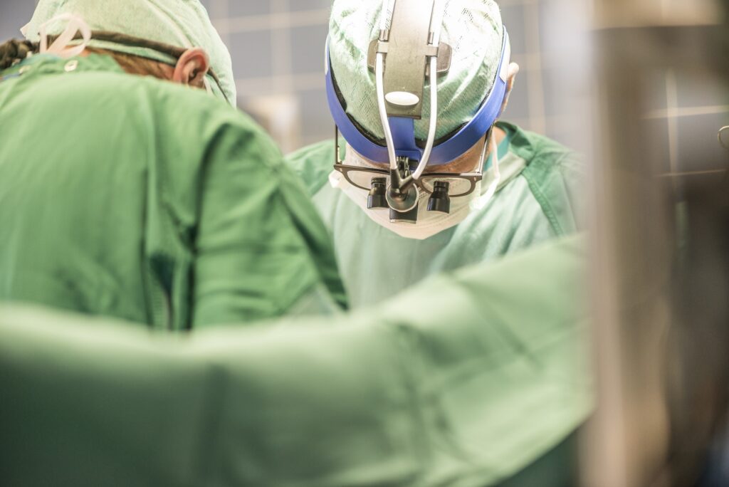 Surgeons executing heart bypass surgery